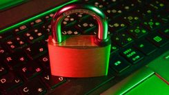 red padlock on black computer keyboard