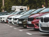 white and red bmw m 3 coupe on road during daytime